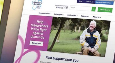 alzheimers society website displayed on laptop screen