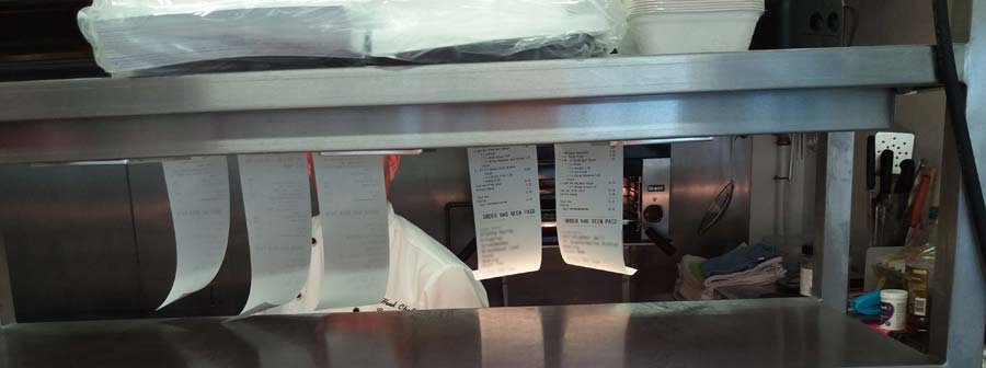 order receipts in just eat restaurant kitchen