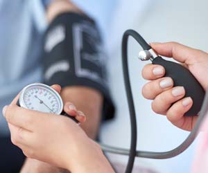 measuring a patients blood pressure