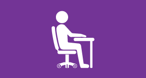 Icon of a person at a desk