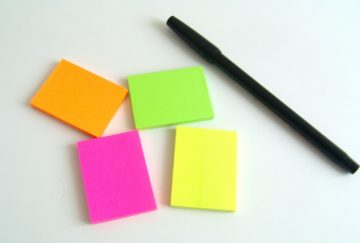 Stack of Post Its & a pen