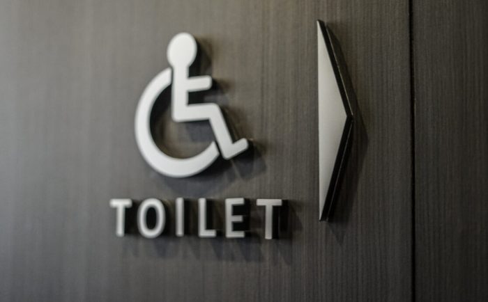 Accessible toilet signage