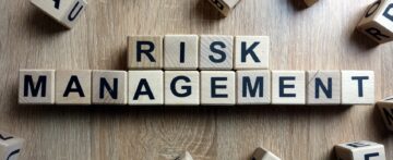 Risk Management spelt out from wooden blocks