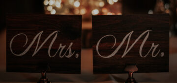 (alt=”name cards on a wedding table - Mrs & Mr”)